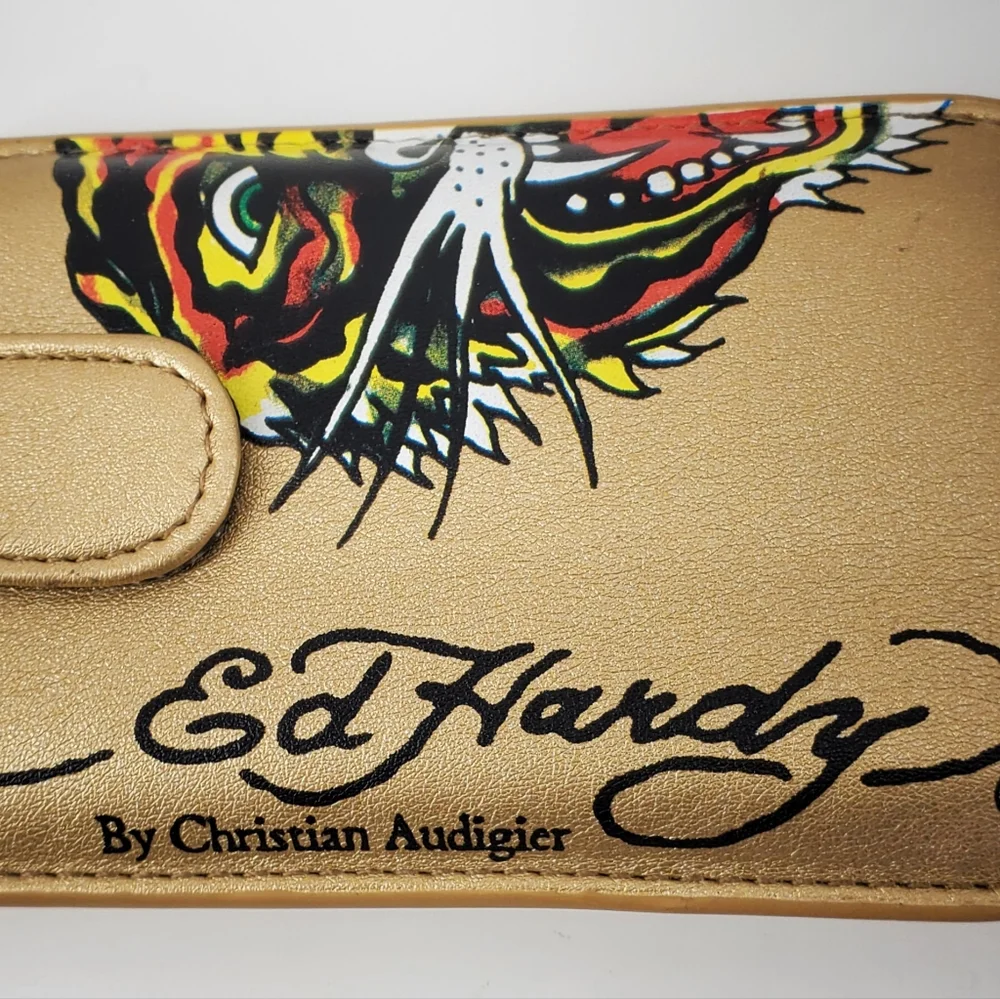 ED HARDY GOLD UNIVERSAL CELL PHONE CASE WITH LEATHER PULL & SNAP CLOSURE. $48.00